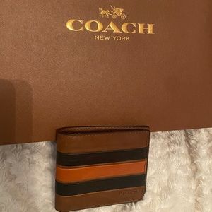 Mint condition, men’s wallet.